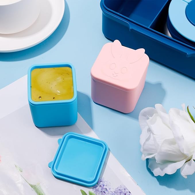 2pcs Silicone Condiment Containers with Lids (Pink, Blue)
